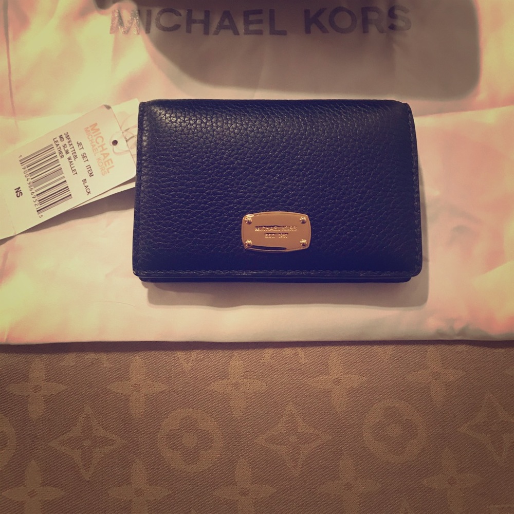 SOLD‼️Michael Kors jet set black leather wallet